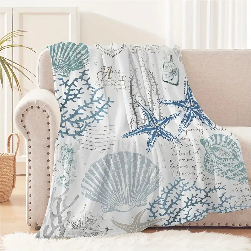 A modern ocean-themed blanket - machine washable flannel with coastal print featuring shells and corals - soft and comfortable multi-purpose blanket suitable for travel, camping, home decor - ideal gift for all seasons80